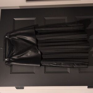 Commense - 1/4 Leather Like Skirt With Flowy Bottom.